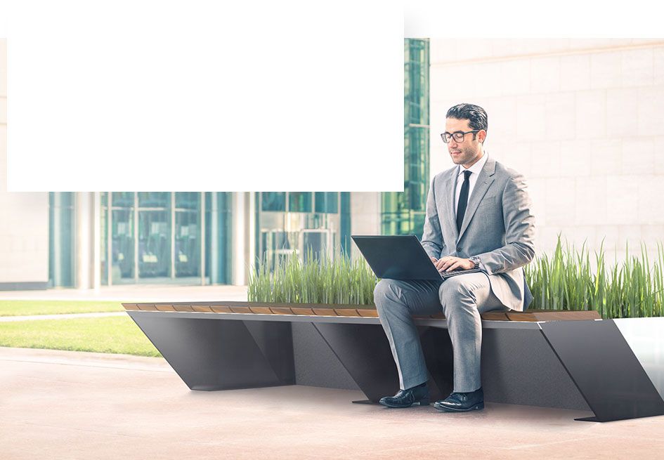 Modern stainless steel bench combined with a flower pot