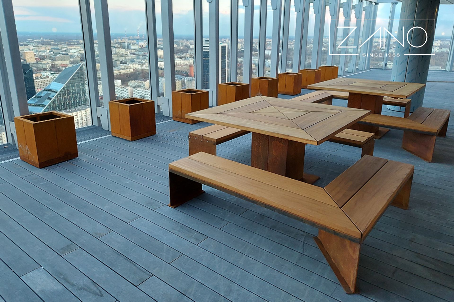 benches, tables and planters made of weathering steel and exotic wood